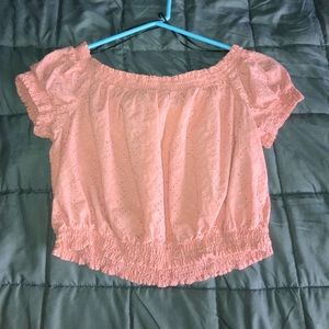 an off the shoulder crop top